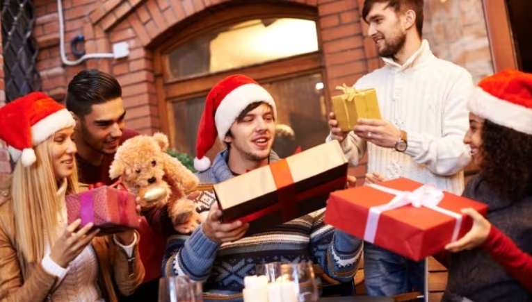 Teenagers receiving gifts